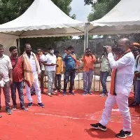 bjp telangana chief bandi sanjay clicks photographers with camera