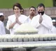rahul gandhi with his sister and brother in law pays tributes to his father rajiv gandhi