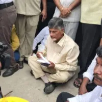 Chandrababu sat on road protesting against YSRCP