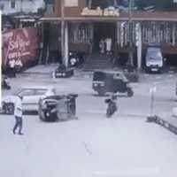 Watch: Woman narrowly escapes from being knocked down by a vehicle