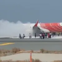 Smoke at Air India plane at Muscat airport