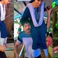 Man climbs Tirumala steps carrying wife on shoulders