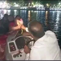 ts minister harish rao drives a boat in siddipet komaticheruvu
