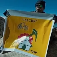 TDP Supremo Chandrababu appreciates Ginjupalli Sivaprasad who displayed TDP Flexi at Mount Everest