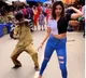 Girl dances on a busy street but this man takes all the attention