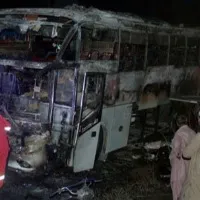 Pakistan bus fire kills at least 18 flood survivors in Karachi