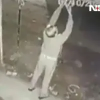 UP cop caught on camera stealing light bulb from roadside shop