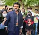 'RRR' star Ram Charan hits it off with school kids in Japan