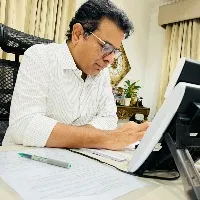 KTR shares his photo with glasses