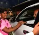 tsr cadre shakes hands with bjp telangana chief bandi sanjay in munugode
