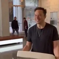 Chief Twit Elon Musk carries sink into Twitter HQ ahead of 44 billion dollars buyout deadline