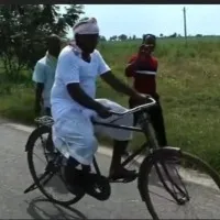 KA Paul cycling in campaign