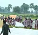 Students saves paddy from rain