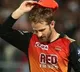 Kane Williamson reacts after Surisers released him
