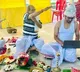 Youth works on laptop while his marriage being done
