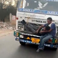 Man accused of stealing wheat bags tied to moving truck's bonnet in Punjab