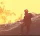 Man Stands At The Edge Of A Lava Ocean In Hair Raising Video