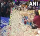 Devotees Shower Notes on Bhajan Singer Kirtidan Gadhvi During Fund Raising Event in Navsari