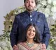 Anant Ambani and Radhika Merchant receive grand welcome at Antilia
