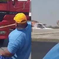 Man pulls 15730 kg truck with his teeth sets Guinness World Record
