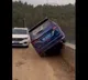 Hair raising video shows how two SUVs cross each other on a narrow bridge