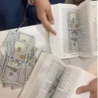 90000 us dollors Stuffed In Books Found At Mumbai Airport