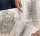 90000 us dollors Stuffed In Books Found At Mumbai Airport