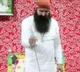Dera Baba cuts cake with big sword