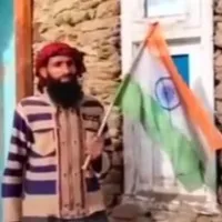 Ex Terrorist unfurls tricolour at his residence