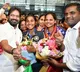 Grand well come to the telangana cricketer g trisha at shamshabad airport