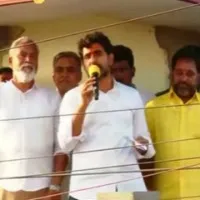 Lokesh gives speech from a building after police denied permission