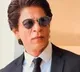 Fan asks SRK to give him Rs1 cr from Pathaans earnings Shah Rukh Funny  Reply