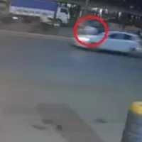 Teenager drags traffic cop for over 1 km on cars bonnet