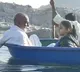 Raghuveera sails with his granddaughter in a coracle