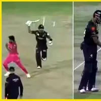 Hassan Ali runs for cover after Babar Azam scares him with the bat