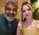 Rajamouli takes award from child actress Violet Mcgraw for RRR