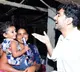 Lokesh gifts children chocolates and books in Padayatra