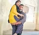 Father carried his daughter on shoulders to exam hall