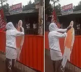 Video shows Karnataka farmer wiping PM's cutout; Shah terms it 'beautiful'