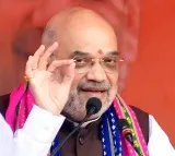 Amit shah shares video of man wiping off rain water on Modi cutout in Karnataka