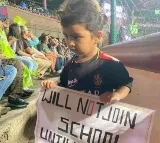 This pic of little girl holding a placard during IPL match goes viral