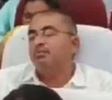Gujarat civic officer suspended for taking a nap during a cms speech