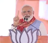 narendra modi satire on congress and jds in karnataka election campaign