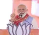 narendra modi satire on congress and jds in karnataka election campaign