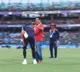 Kohli touches his childhood coach feet