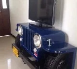 Man Uses Mahindra SUV Cut Out As TV Stand At Home Anand Mahindra Is Flattered