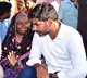 Lokesh assures an old woman to go Hajj