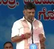 as a sign of respect dk shivakumar bows on karnataka vidhan soudha steps