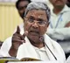 Siddaramaiah take oath and sign on five assurances