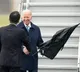 Biden struggles to open umbrella during japan visit